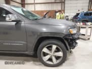 ✅ 2014 Jeep Grand Cherokee Overland • VIN: 1C4RJFCGXEC340052 • Lot: 43485667. Listed on IAAI with 113,840 mi. Free auction sales archive from the USA and detailed vehicle history report at DreamBid. Image 17.