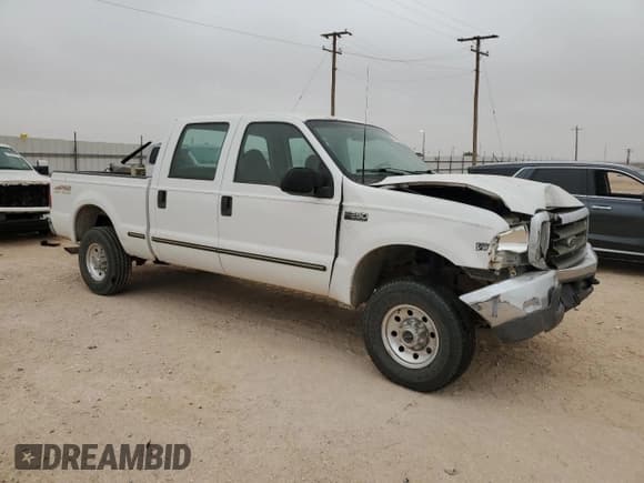 ✅ 1999 Ford F-250 XL • VIN: 1FTNW21F5XEB69589 • Lot: 51871235. Listed on Copart with 302,243 mi. Free auction sales archive from the USA and detailed vehicle history report at DreamBid. Image 4.