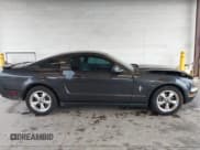 ✅ 2007 Ford Mustang Deluxe • VIN: 1ZVHT80NX75349309 • Lot: 43716028. Listed on IAAI with 148,642 mi. Free auction sales archive from the USA and detailed vehicle history report at DreamBid. Image 13.