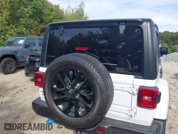 ✅ 2023 Jeep Wrangler Sahara • VIN: 1C4JJXP68PW696246 • Lot: 43210023. Listed on IAAI with 41,232 mi. Free auction sales archive from the USA and detailed vehicle history report at DreamBid. Image 16.