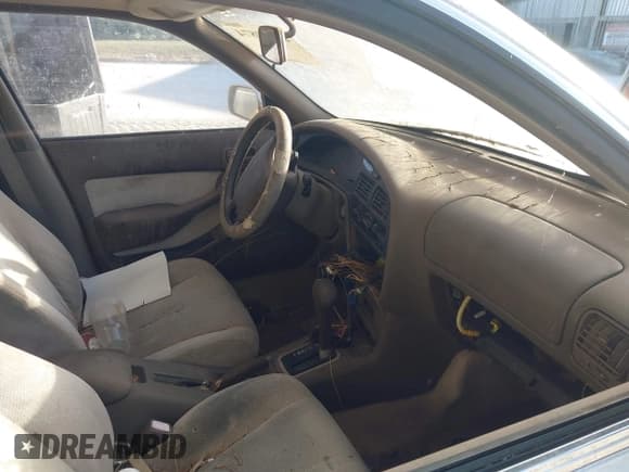 ✅ 1995 Toyota Camry LE • VIN: JT2SK12E7S0273689 • Лот: 43799874. Опубликован ранее на IAAI с пробегом 154 750 миль. Бесплатный доступ к архиву аукционных продаж из США и подробный отчёт об истории автомобиля на DreamBid. Изображение 5.