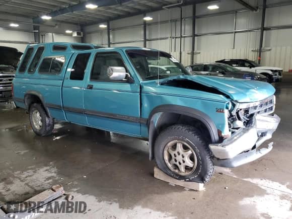 1995 Dodge Dakota with VIN 1B7GG23X0SW933444, listed as a Copart auction lot 77544414 with 180,529 mi miles and Salvage title. Bid and sale history available at DreamBid. Image 4.