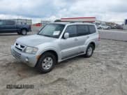 ✅ 2003 Mitsubishi Montero Limited • VIN: JA4NW51S53J037166 • Lot: 43302034. Listed on IAAI with 145,965 mi. Free auction sales archive from the USA and detailed vehicle history report at DreamBid. Image 2.