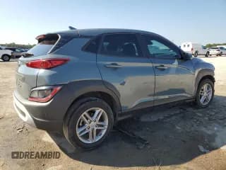 ✅ 2022 Hyundai Kona SE • VIN: KM8K22AB5NU864388 • Лот: 89616295. Опубликован ранее на Copart с пробегом 62 611 миль. Бесплатный доступ к архиву аукционных продаж из США и подробный отчёт об истории автомобиля на DreamBid. Изображение 3.