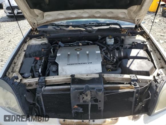 ✅ 2005 Cadillac DeVille • VIN: 1G6KD54Y85U157658 • Lot: 69035874. Listed on Copart with 173,417 mi. Free auction sales archive from the USA and detailed vehicle history report at DreamBid. Image 11.