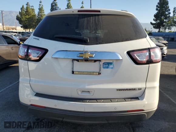 ✅ 2014 Chevrolet Traverse LT • VIN: 1GNKRHKD3EJ375953 • Lot: 67070915. Listed on Copart with 153,737 mi. Free auction sales archive from the USA and detailed vehicle history report at DreamBid. Image 6.