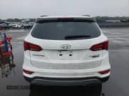 ✅ 2017 Hyundai Santa Fe Ultimate • VIN: 5NMZWDLA8HH048973 • Лот: 46044363. Опубликован ранее на Copart с пробегом 90 001 миль. Бесплатный доступ к архиву аукционных продаж из США и подробный отчёт об истории автомобиля на DreamBid. Изображение 6.