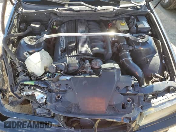 1998 BMW 3 Series M3s with VIN WBSCD9327WEE08697, listed as a Copart auction lot 64621925 with 249,221 mi miles and Salvage title. Bid and sale history available at DreamBid. Image 11.