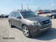 ✅ 2010 GMC Acadia SLT1 • VIN: 1GKLVMED9AJ190317 • Lot: 42833909. Listed on IAAI with 153,482 mi. Free auction sales archive from the USA and detailed vehicle history report at DreamBid. Image 1.