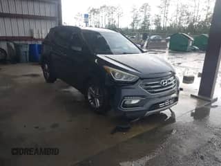 2017 Hyundai Santa Fe 2.4L z VIN 5XYZU3LB9HG410425, wystawiony jako IAAI lot #42917591 z przebiegiem 118 605 mil mil oraz . Historia ofert i sprzedaży dostępna na DreamBid. Obrazek 1.