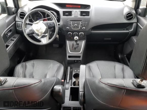 ✅ 2015 Mazda 5 Grand Touring • VIN: JM1CW2DLXF0189535 • Лот: 63635775. Опубликован ранее на Copart с пробегом 69 551 миль. Бесплатный доступ к архиву аукционных продаж из США и подробный отчёт об истории автомобиля на DreamBid. Изображение 8.