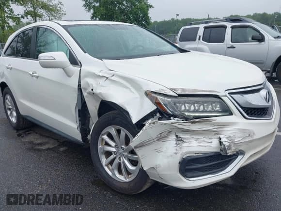 ✅ 2018 Acura RDX • VIN: 5J8TB4H31JL018201 • Lot: 42459595. Listed on IAAI with 106,523 mi. Free auction sales archive from the USA and detailed vehicle history report at DreamBid. Image 1.