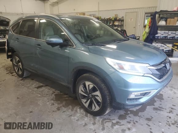 ✅ 2015 Honda CR-V Touring • VIN: 5J6RM3H9XFL020337 • Lot: 81793395. Listed on Copart with 141,448 mi. Free auction sales archive from the USA and detailed vehicle history report at DreamBid. Image 4.