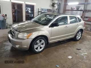 ✅ 2010 Dodge Caliber Mainstreet • VIN: 1B3CB3HAXAD627936 • Лот: 81231994. Опубликован ранее на Copart с пробегом 118 279 миль. Бесплатный доступ к архиву аукционных продаж из США и подробный отчёт об истории автомобиля на DreamBid. Изображение 1.