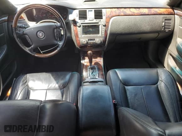 ✅ 2006 Cadillac DTS 1SE • VIN: 1G6KD57996U242434 • Lot: 65639195. Listed on Copart with 201,424 mi. Free auction sales archive from the USA and detailed vehicle history report at DreamBid. Image 8.