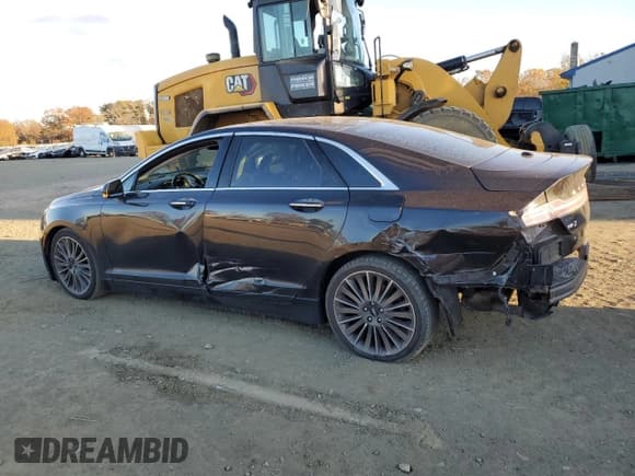 ✅ 2015 Lincoln MKZ • VIN: 3LN6L2JK2FR617403 • Lot: 90760715. Wystawiony na Copart z przebiegiem 128 703 mil. Bezpłatny archiwum sprzedaży aukcyjnych z USA i szczegółowy raport historii pojazdu na DreamBid. Zdjęcie 2.