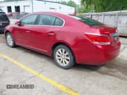 ✅ 2013 Buick LaCrosse Leather • VIN: 1G4GC5ER1DF211815 • Lot: 42372641. Listed on IAAI with 167,020 mi. Free auction sales archive from the USA and detailed vehicle history report at DreamBid. Image 3.