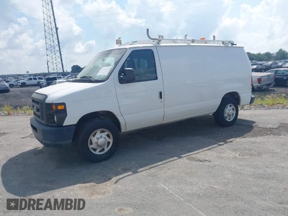 ✅ 2014 Ford Econoline Cargo Commercial • VIN: 1FTNE2EL4EDB06179 • Lot: 42512885. Listed on IAAI with 99,138 mi. Free auction sales archive from the USA and detailed vehicle history report at DreamBid. Image 2.