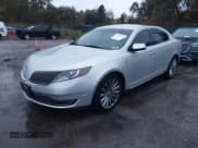 ✅ 2014 Lincoln MKS • VIN: 1LNHL9EK4EG604394 • Лот: 43575459. Опубликован ранее на IAAI с пробегом 182 684 миль. Бесплатный доступ к архиву аукционных продаж из США и подробный отчёт об истории автомобиля на DreamBid. Изображение 17.