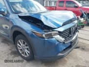 ✅ 2023 Mazda CX-5 S • VIN: JM3KFBAM2P0126351 • Lot: 42340700. Listed on IAAI with 11,995 mi. Free auction sales archive from the USA and detailed vehicle history report at DreamBid. Image 17.