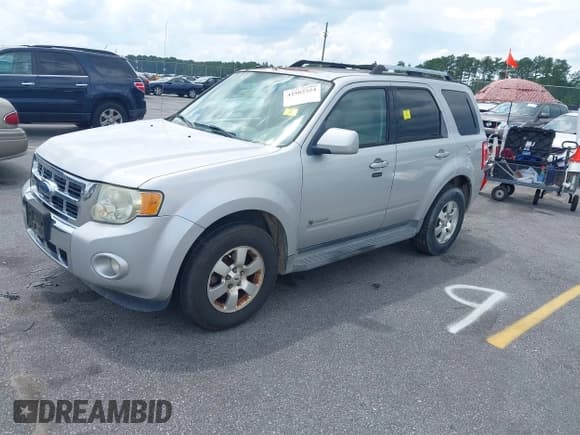 ✅ 2009 Ford Escape Hybrid • VIN: 1FMCU49399KB18857 • Lot: 42502324. Wystawiony na IAAI z przebiegiem 227 828 mil. Bezpłatny archiwum sprzedaży aukcyjnych z USA i szczegółowy raport historii pojazdu na DreamBid. Zdjęcie 2.