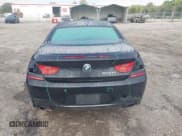 ✅ 2012 BMW 6 Series 650i xDrive • VIN: WBALX5C52CC894130 • Лот: 43309112. Опубликован ранее на IAAI с пробегом 97 370 миль. Бесплатный доступ к архиву аукционных продаж из США и подробный отчёт об истории автомобиля на DreamBid. Изображение 16.