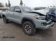 ✅ 2023 Toyota Tacoma TRD Off Road • VIN: 3TMDZ5BN8PM159787 • Лот: 43733603. Опубликован ранее на IAAI с пробегом 62 224 миль. Бесплатный доступ к архиву аукционных продаж из США и подробный отчёт об истории автомобиля на DreamBid. Изображение 1.