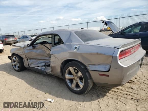 ✅ 2014 Dodge Challenger SXT • VIN: 2C3CDYAG4EH210023 • Lot: 77484374. Wystawiony na Copart z przebiegiem Nie podano. Bezpłatny archiwum sprzedaży aukcyjnych z USA i szczegółowy raport historii pojazdu na DreamBid. Zdjęcie 2.