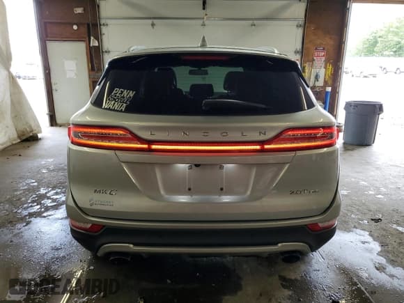 ✅ 2017 Lincoln MKC Premiere • VIN: 5LMCJ1D96HUL49475 • Лот: 70009445. Опубликован ранее на Copart с пробегом 90 043 миль. Бесплатный доступ к архиву аукционных продаж из США и подробный отчёт об истории автомобиля на DreamBid. Изображение 6.