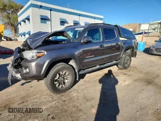 ✅ 2018 Toyota Tacoma TRD Off Road • VIN: 5TFCZ5AN8JX143104 • Лот: 86816755. Опубликован ранее на Copart с пробегом 107 690 миль. Бесплатный доступ к архиву аукционных продаж из США и подробный отчёт об истории автомобиля на DreamBid. Изображение 1.