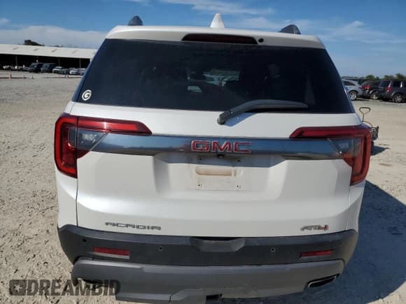 ✅ 2020 GMC Acadia AT4 • VIN: 1GKKNLLS4LZ107937 • Lot: 89531025. Listed on Copart with 74,969 mi. Free auction sales archive from the USA and detailed vehicle history report at DreamBid. Image 6.