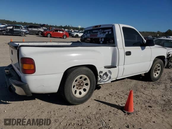 2002 GMC Sierra 1500 with VIN 1GTEC14W22Z331436, listed as a Copart auction lot 84550994 with 243,764 mi miles and Salvage title. Bid and sale history available at DreamBid. Image 3.