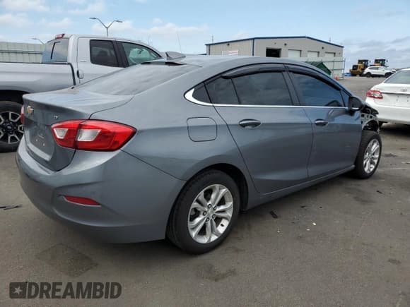 ✅ 2019 Chevrolet Cruze LT • VIN: 1G1BE5SM7K7124924 • Lot: 49528123. Listed on Copart with 64,582 mi. Free auction sales archive from the USA and detailed vehicle history report at DreamBid. Image 3.