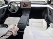 ✅ 2023 Tesla Model Y Long Range • VIN: 7SAYGDEE9PA098533 • Лот: 82690655. Опубликован ранее на Copart с пробегом 59 560 миль. Бесплатный доступ к архиву аукционных продаж из США и подробный отчёт об истории автомобиля на DreamBid. Изображение 8.