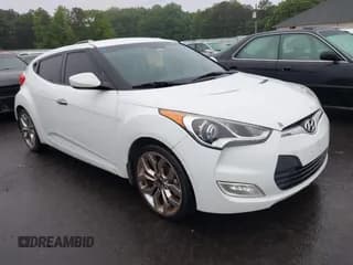 ✅ 2015 Hyundai Veloster • VIN: KMHTC6AD1FU222147 • Lot: 42338622. Listed on IAAI with 158,231 mi. Free auction sales archive from the USA and detailed vehicle history report at DreamBid. Image 1.