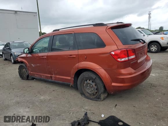 ✅ 2012 Dodge Journey SE • VIN: 3C4PDCABXCT311155 • Lot: 56596135. Listed on Copart with 140,992 mi. Free auction sales archive from the USA and detailed vehicle history report at DreamBid. Image 2.