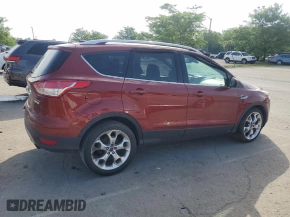 ✅ 2015 Ford Escape Titanium • VIN: 1FMCU0J93FUC34080 • Lot: 57169665. Wystawiony na Copart z przebiegiem 243 518 mil. Bezpłatny archiwum sprzedaży aukcyjnych z USA i szczegółowy raport historii pojazdu na DreamBid. Zdjęcie 3.