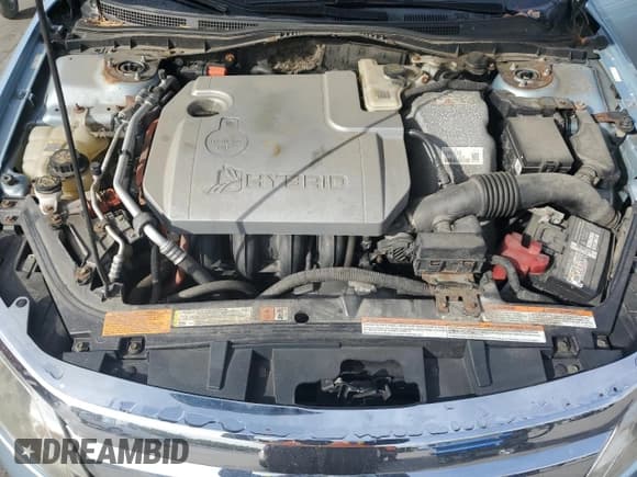 ✅ 2010 Ford Fusion Hybrid • VIN: 3FADP0L33AR170394 • Лот: 86490985. Опубликован ранее на Copart с пробегом 209 296 миль. Бесплатный доступ к архиву аукционных продаж из США и подробный отчёт об истории автомобиля на DreamBid. Изображение 11.