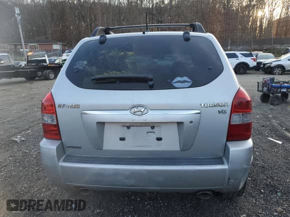 2007 Hyundai Tucson SE z VIN KM8JN12D17U587870, wystawiony jako Copart lot #80851704 z przebiegiem 185 437 mil mil oraz Szkoda całkowita • Salvage title. Historia ofert i sprzedaży dostępna na DreamBid. Obrazek 6.