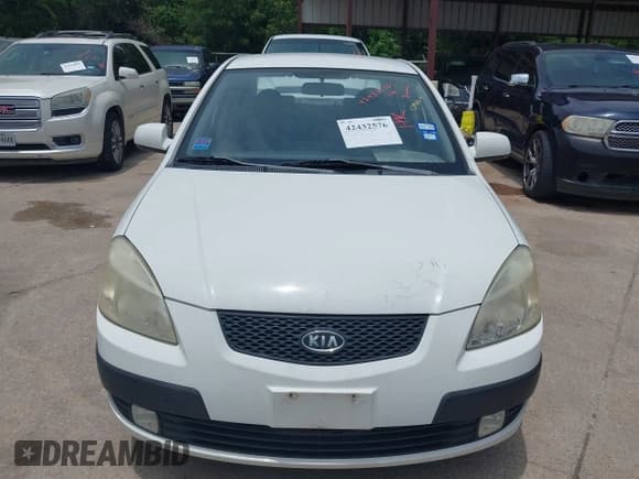 ✅ 2009 Kia Rio LX • VIN: KNADE223096557455 • Lot: 42432576. Listed on IAAI with 155,523 mi. Free auction sales archive from the USA and detailed vehicle history report at DreamBid. Image 6.