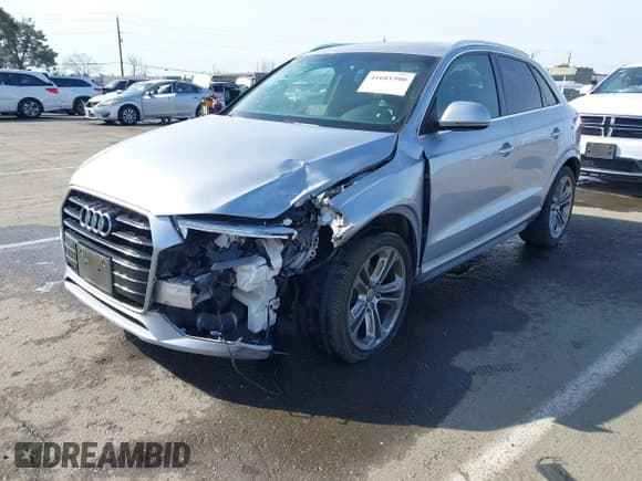 ✅ 2018 Audi Q3 Premium Plus • VIN: WA1HCCFS9JR004429 • Lot: 41681900. Listed on IAAI with 95,263 mi. Free auction sales archive from the USA and detailed vehicle history report at DreamBid. Image 2.