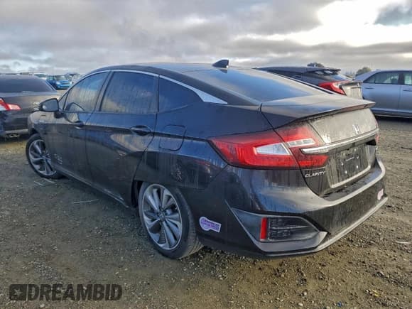 ✅ 2018 Honda Clarity • VIN: JHMZC5F11JC012250 • Лот: 93790105. Опубликован ранее на Copart с пробегом 68 370 миль. Бесплатный доступ к архиву аукционных продаж из США и подробный отчёт об истории автомобиля на DreamBid. Изображение 2.