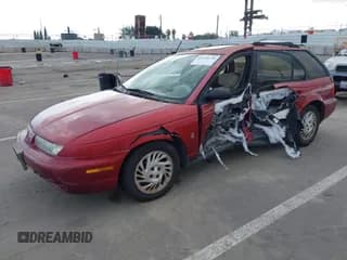 ✅ 1999 Saturn SW • VIN: 1G8ZK8276XZ333989 • Лот: 41550338. Опубликован ранее на IAAI с пробегом 142 592 миль. Бесплатный доступ к архиву аукционных продаж из США и подробный отчёт об истории автомобиля на DreamBid. Изображение 2.