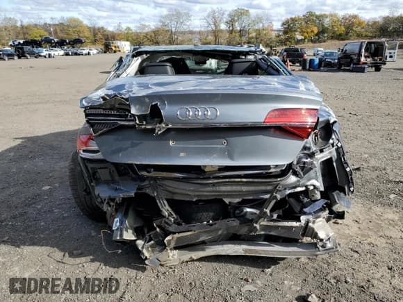 ✅ 2016 Audi A8 Sport • VIN: WAU43AFD3GN006801 • Лот: 90392455. Опубликован ранее на Copart с пробегом Не указан. Бесплатный доступ к архиву аукционных продаж из США и подробный отчёт об истории автомобиля на DreamBid. Изображение 6.