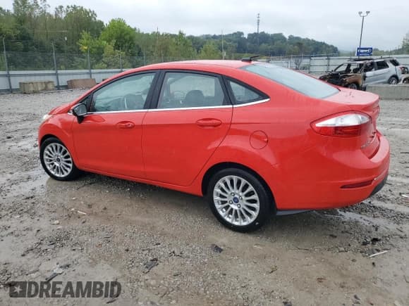 ✅ 2014 Ford Fiesta Titanium • VIN: 3FADP4CJ6EM171340 • Lot: 82093165. Listed on Copart with 104,005 mi. Free auction sales archive from the USA and detailed vehicle history report at DreamBid. Image 2.