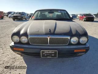✅ 1997 Jaguar XJ Vanden Plas • VIN: SAJKX6244VC801688 • Лот: 80841864. Опубликован ранее на Copart с пробегом Не указан. Бесплатный доступ к архиву аукционных продаж из США и подробный отчёт об истории автомобиля на DreamBid. Изображение 5.