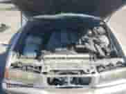 1998 BMW 3 Series 328i z VIN WBACD4326WAV64466, wystawiony jako Copart lot #74957534 z przebiegiem 152 963 mil mil oraz Szkoda całkowita • Salvage title. Historia ofert i sprzedaży dostępna na DreamBid. Obrazek 11.