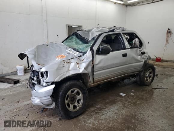 ✅ 2002 Isuzu Rodeo • VIN: 4S2DM58W924331185 • Лот: 62650715. Опубликован ранее на Copart с пробегом Не указан. Бесплатный доступ к архиву аукционных продаж из США и подробный отчёт об истории автомобиля на DreamBid. Изображение 1.