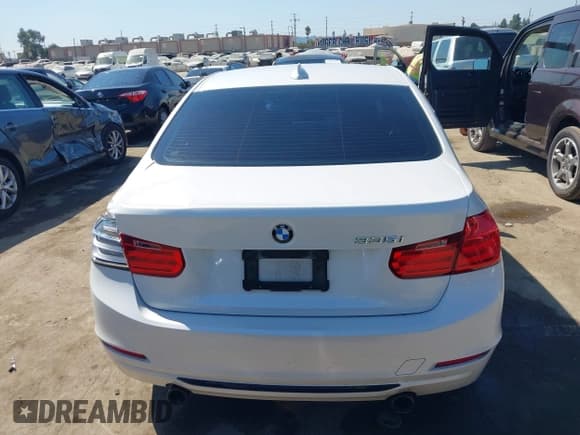 ✅ 2013 BMW 3 Series 335i • VIN: WBA3A9C56DF475075 • Lot: 43104849. Listed on IAAI with 141,148 mi. Free auction sales archive from the USA and detailed vehicle history report at DreamBid. Image 16.