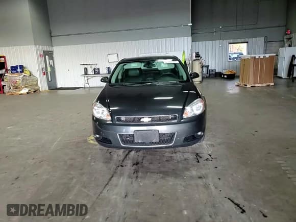 ✅ 2014 Chevrolet Impala LTZ • VIN: 2G1WC5E36E1156579 • Lot: 91980555. Listed on Copart with 149,625 mi. Free auction sales archive from the USA and detailed vehicle history report at DreamBid. Image 13.